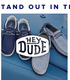 Two pairs of blue Hey Dude loafers. Shop Hey Dude. 