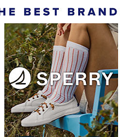 A person wearing white Sperry shoes. Shop Sperry. 