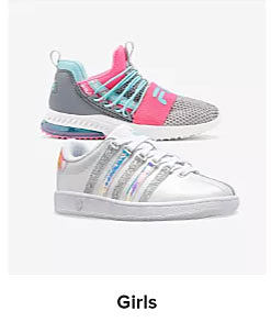 Two pairs of girls fashion sneakers. Shop girls. 