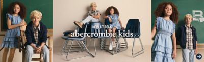 A girl in a blue dress. A boy in blue jeans and a plaid shirt. New at Belk. Abercrombie kids.