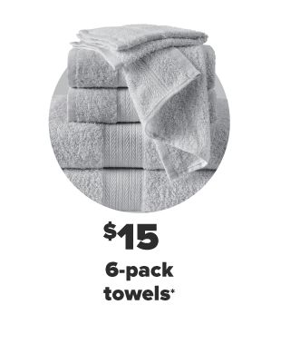 A stack of gray towels of various sizes. $15 6-pack towels. 