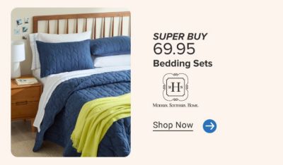 A bed with blue bedding. Super buy 69.95 bedding sets from Modern Southern Home. Shop now.