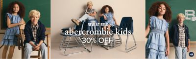 Boys and girls in a classroom wearing abercrombie kids apparel. New at Belk, abercrombie kids for 30% off