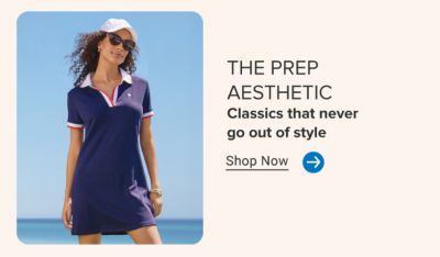 Image of woman in navy collared dress and baseball hat. The prep aesthetic. Classics that never go out of style. Shop now.