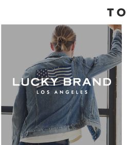 A man in a Lucky Brand denim jacket with an American flag on the back. Lucky Brand Los Angeles. 