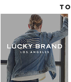A man in a Lucky Brand denim jacket with an American flag on the back. Lucky Brand Los Angeles. 