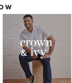 A man in a white short sleeve button up and dark blue jeans. Crown and Ivy. 