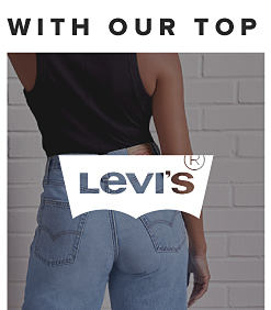 A woman in a black top and blue jeans. Levi's.