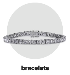 A diamond tennis bracelet. Bracelets.
