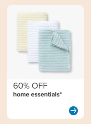 Image of three towels in different colors. 60% off home essentials.