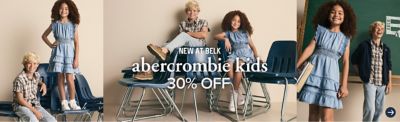 A boy and girl in a classroom wearing back to school styles. New at Belk, abercrombie kid for 30% off.