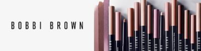 An assortment of Bobbi Brown eyeshadow sticks in different shades. Bobbi Brown.