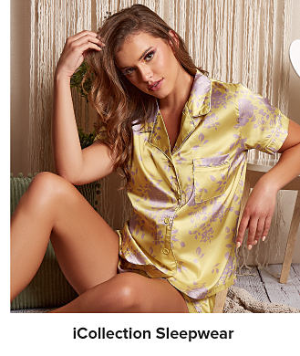Image of a woman wearing a satin pajama set. iCollection sleepwear. 