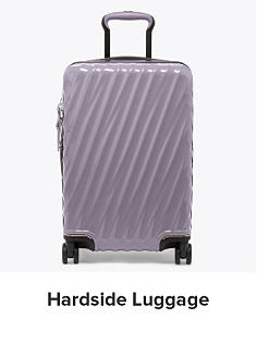 Image of a purple hard-case rolling suitcase. Shop hardside luggage.