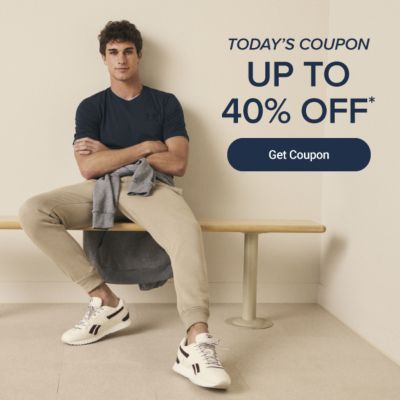 Today's coupon. Up to 40% off. Get coupon. Man in dark t-shirt and khaki pants sitting on a bench.