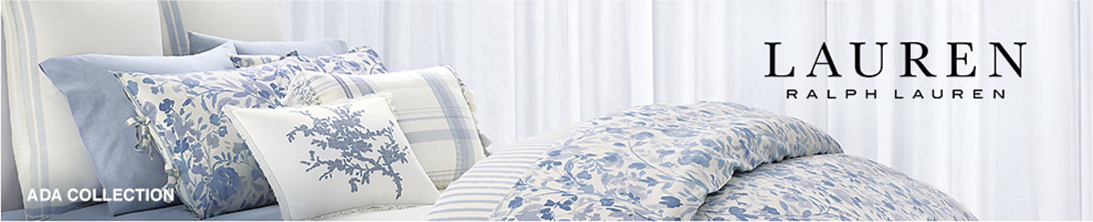 A bedding set in a blue and white floral pattern with matching pillows. Ada Collection. Lauren Ralph Lauren. 