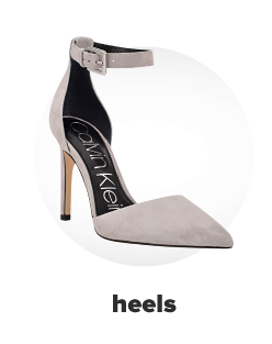 A gray Calvin Klein heel with a stiletto heel and a strap at the ankle. Heels. 