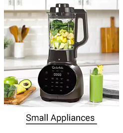A blender filled with ingredients. Shop Small Appliances.