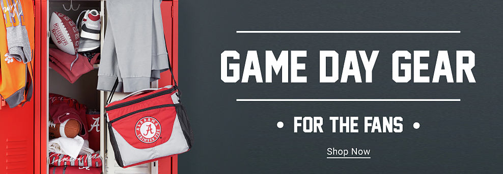 A row of red lockers. One has an Alabama Crimson Tide cooler hanging off the door, with Alabama and Mississippi State gear inside. One locker has a Clemson Tigers jacket and t-shirt hanging on the door. Game day gear for the fans. Shop now.