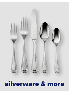 Two forks, one knife and two spoons. Silverware and flatware.
