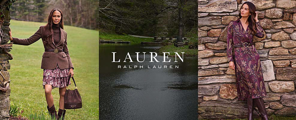 Lauren Ralph Lauren. A woman in a floral skirt and brown blazer over a black turtleneck holds a brown leather bag and stands in a field. A picture of a lake with a stone bridge. A woman in a purple paisley tunic dress with a stone wall behind her. 