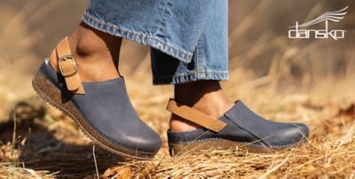 Close up image of a person in Dankso clogs.