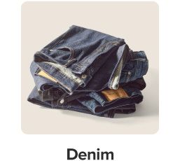 Image of a stack of jeans. Shop denim.