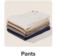 Image of a stack of pants. Shop pants.