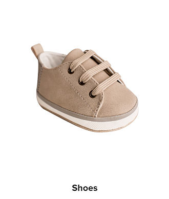 An image of a small brown shoe. Shop shoes.