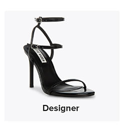 A back high heeled shoe. Shop designer.