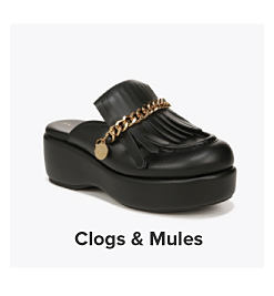 A black leather platform mule shoe. Shop clogs and mules.