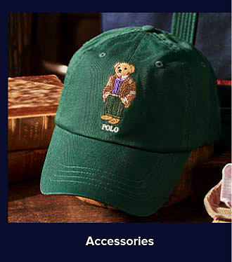 A green hat with Ralph Lauren's polo bear on it. Shop accessories.