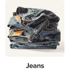 A stack of folded jeans. Shop jeans.