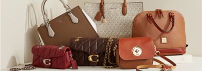 Designer Bags. Image of six different colored bags from different brands.