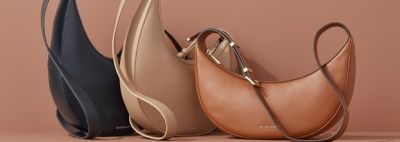 Shoulder Bags. Image of three shoulder bags from Michael Kors.