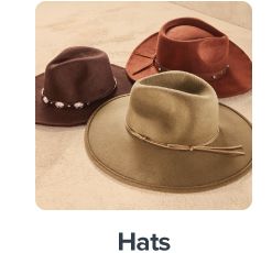 An image of three western hats in various colors. Shop hats.