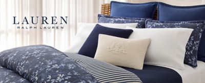 Image of a bed with blue bedding. Caterina collection. Lauren Ralph Lauren.