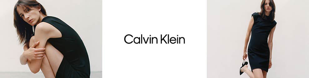 A woman in a black dress crouches down and wraps her arms around her knees. A woman in a black dress reaches down to take off her black high heels. Calvin Klein. Shop now. 