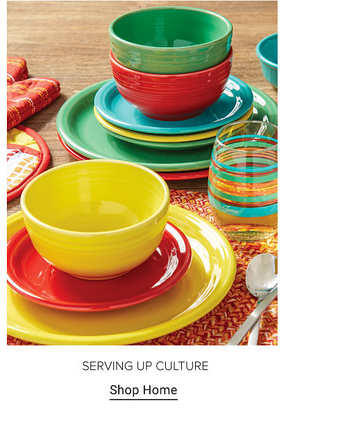 Assortment of colorful bowls and plates. Serving up culture. Shop home. 