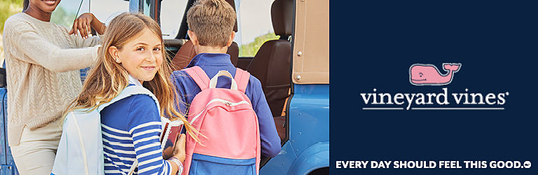A boy and a girl wearing Vineyard Vines outfits and backpacks getting into a jeep. Vineyard Vines. Every day should feel this good.