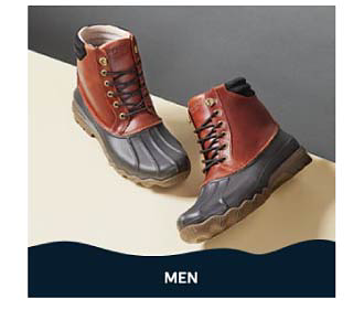 A pair of lace up rubber boots. Shop men.