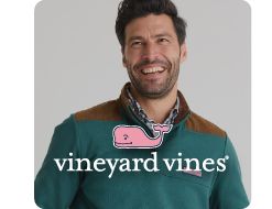 Image of a man in a quarter zip. Shop Vineyard Vines.