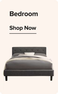 Grey bed frame with pushpin headboard, grey comforter, and white sheets. Shop bedroom furniture.