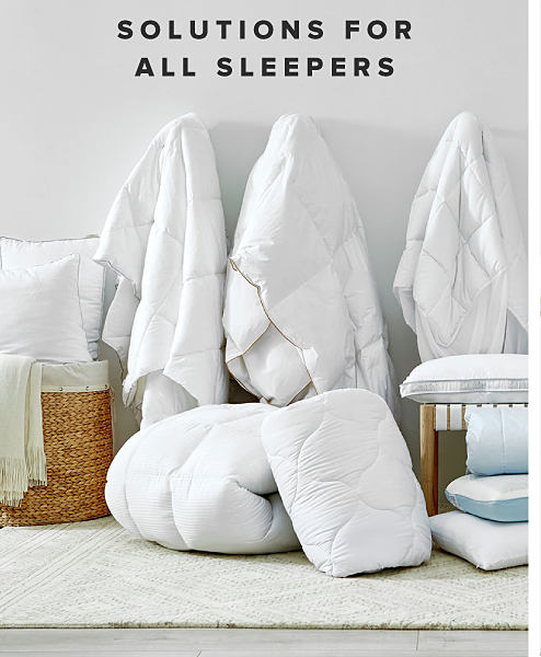 An assortment of blankets, pillows and mattress pads. Solutions for all sleepers.