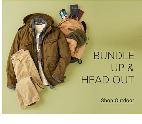 A pair of tan pants with a tee, button up shirt and olive coat all layered together. Beside this is a tan backpack filled with outdoor essentials, including a notebook, water bottle and beanie. Bundle up and head out. Shop outdoor.