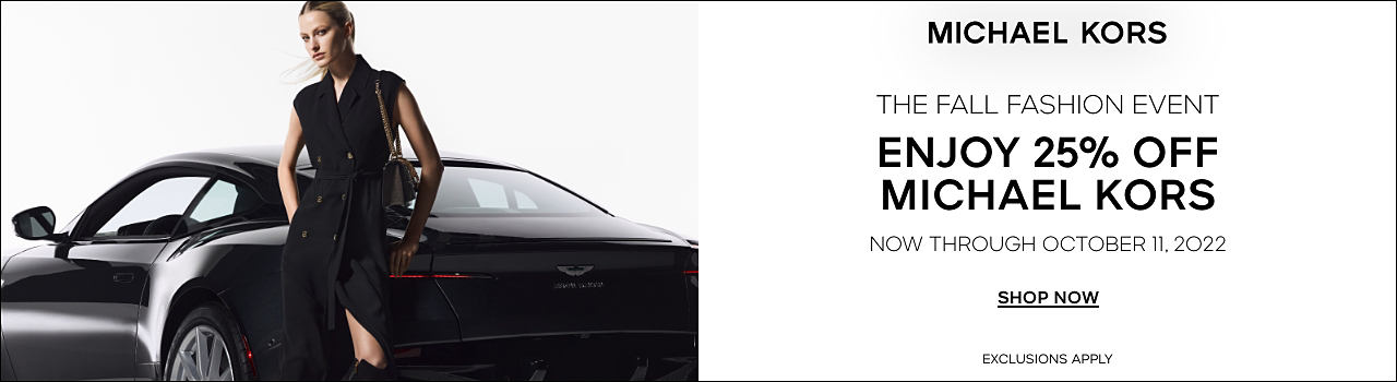 Woman wearing black button up dress and black handbag, standing in front of a black car. Michael Kors. The fall fashion event. Enjoy 25% off Michael Kors now through October 11, 2022. Shop Now. Exclusions apply. 