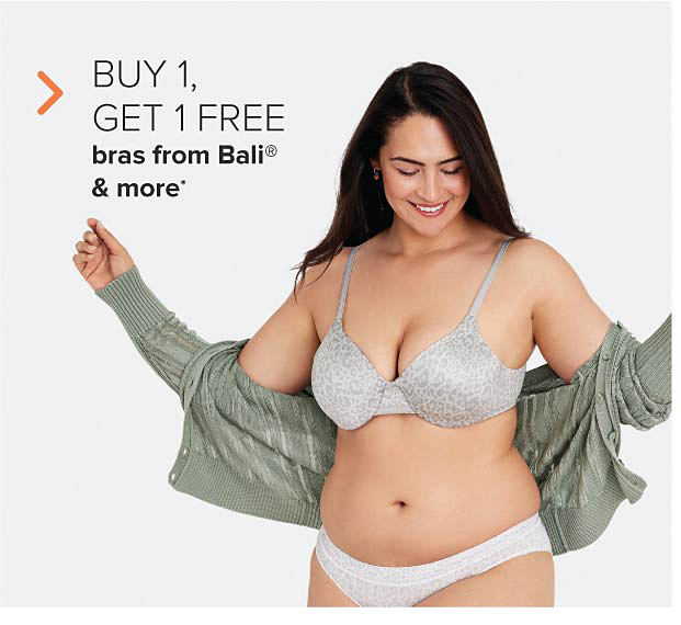 Woman wearing matching grey bra and panties and green cardigan. Buy 1, get 1 free bras from Bali and more. 