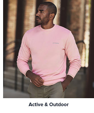 A man in a pink sweatshirt. Shop active and outdoor.