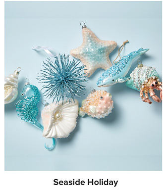 Blue coastal Christmas ornaments. Shop Seaside Holiday.