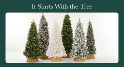 It starts with the tree. Green and white Christmas trees in various styles.